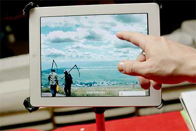 Rhodes Adobe Article still